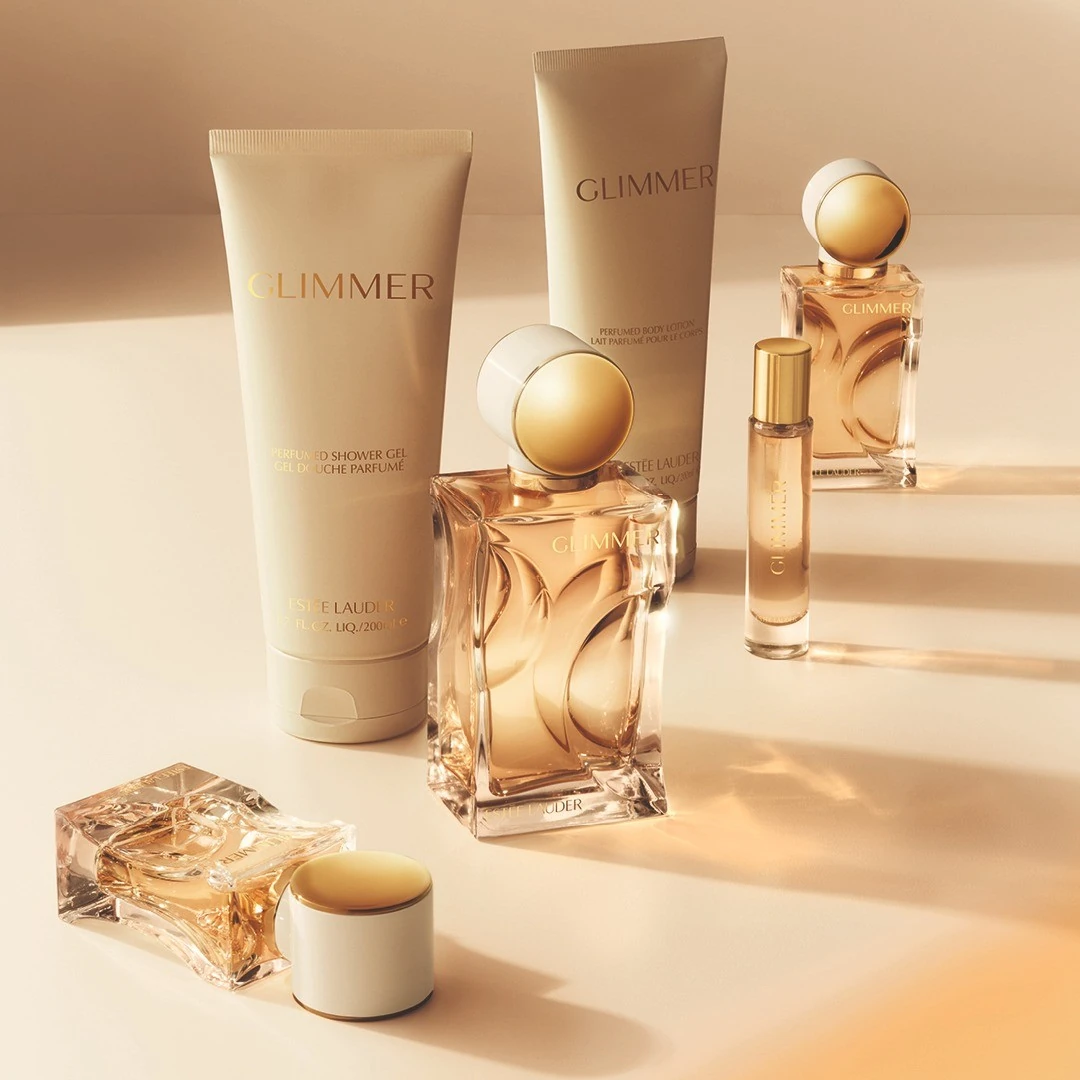Estée Lauder Magnolia Fleur fragrance and body care photographed on sunlit stone