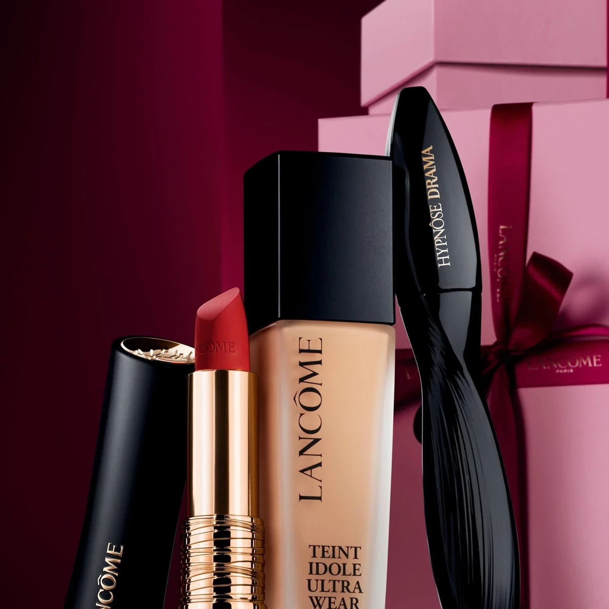 Lancôme foundation, lipstick and mascara photographed with pink gift boxes