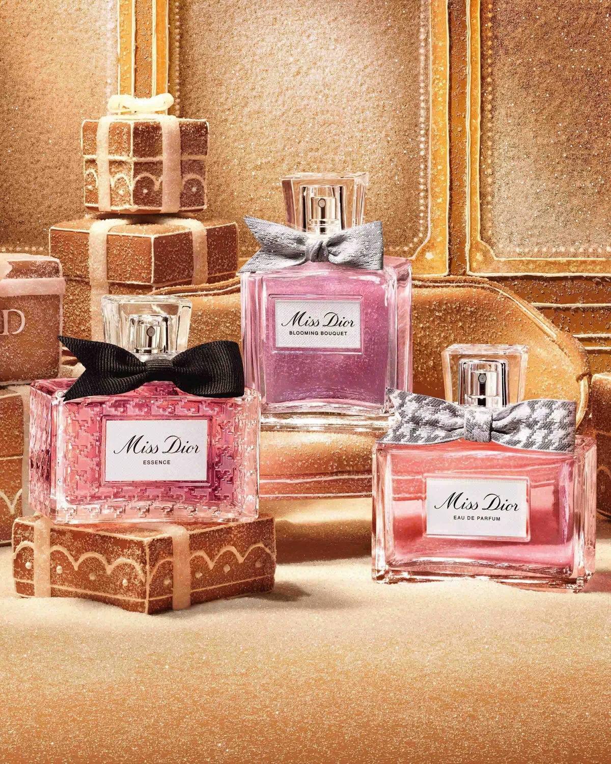 Miss Dior perfumes photographed together in a gold interior