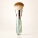 AI-generated illustration of La Mer The Foundation Brush; actual packaging may differ.